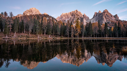 Nice view around Lago Antorno or lake Antorno after sunset . One of the most beautiful scenic lake in Dolomites  during Autumn season , Dolomites , South Tyrol , Italy.