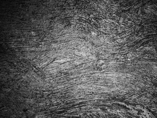 Abstract scratch grunge concrete wall texture. Use as a background or wallpaper. Space for text. Black and white, so contrast and grainy