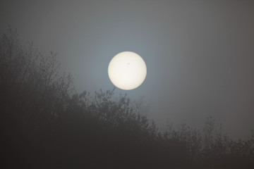 sun around fog