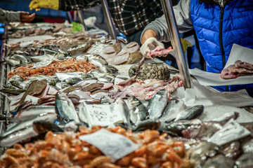 Venetian fish market. The Rialto fish market is located alongside the Grand Canal near the Rialto...