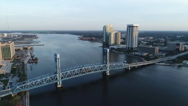 Sunset drone footage of the river in downtown Jacksonville, Florida.