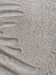 interesting industrial background and texture clean gray sand with short stains on the left