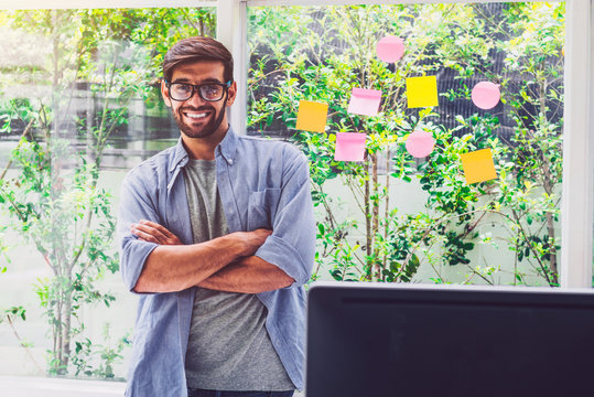 A man happy and smile at home office.