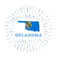 Oklahoma sunburst badge. The US state sign with a map of Oklahoma with the state flag. Colorful rays around the logo. Vector illustration.