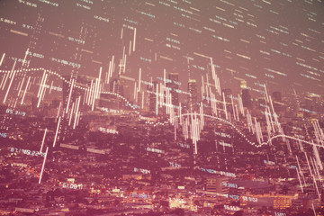 Financial graph on night city scape with tall buildings background double exposure. Analysis concept.