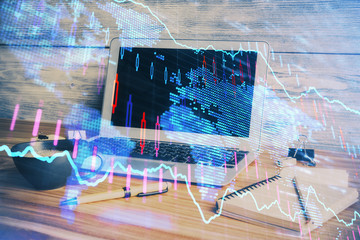 Multi exposure of graph and financial info and work space with computer background. Concept of international online trading.