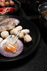 Chinese style hot pot shabu, meat and seafood with vegetables