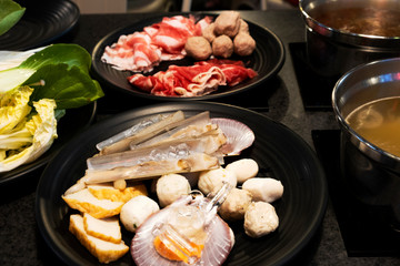 Chinese style hot pot shabu, meat and seafood with vegetables