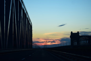 Obraz premium Sunset above an old industrial bridge 2