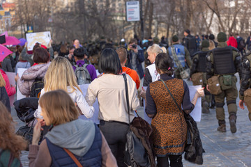 Peaceful demonstration of people in a modern city.