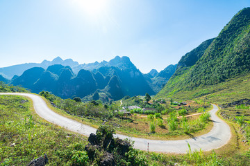 Ha Giang karst geopark mountain landscape in North Vietnam. Winding road in stunning scenery. Ha...