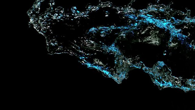 Water splashing on black background, super slow motion. Filmed on high speed cinema camera, 1000 fps.