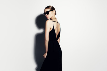 fashion portrait of beautiful model with sunglasses - 313063137