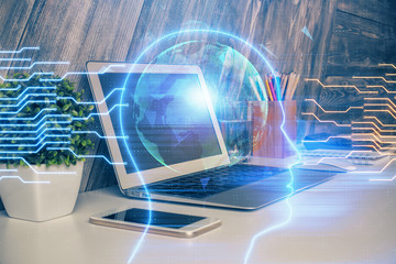 Multi exposure of work table with computer and brain hologram. Brainstorm concept.