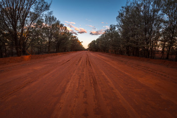 red dirt road in the evening