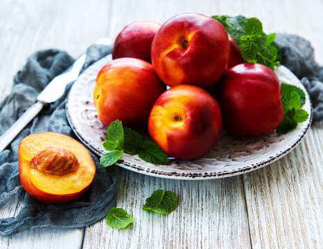 Plate with fresh nectarines