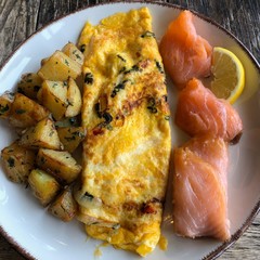 Savory Breakfast Plate: Salmon, Potatoes, Omelette