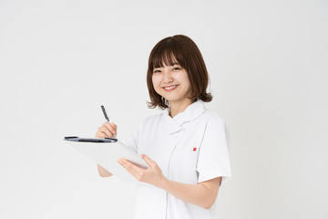 問診する看護師