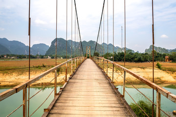 Rustic iron bridge in a rural part of Phong Nha  Vietnam 