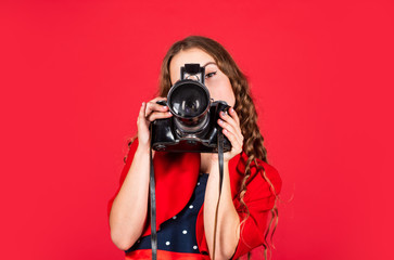 fashion journalist is my future career. little reporter make photo. vintage camera. girl with retro camera. capture childhood memories. SLR camera. beautiful child photographer hold retro camera