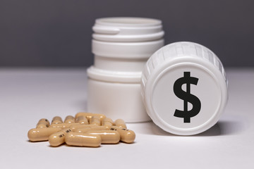 Pictogramme dollar sur boite de médicaments