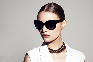 fashion portrait of beautiful model with sunglasses  - 313066157