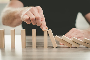 Concept of business control by stopping domino effect