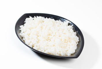 bowl of boiled rice on white background
