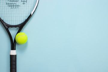 Tennis ball and racket isolated background. Top view