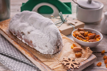 Fototapeta premium Traditional christmas stollen. Sweet holiday homemade dessert