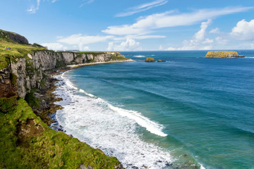 Northern Irish coastline in Carrick-a-rede in Ballycastle. One of the most iconic tourist attractions in Nothern Ireland.