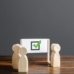 People surrounded a whiteboard with a green checkmark. Right collective choice, smart strategy and...