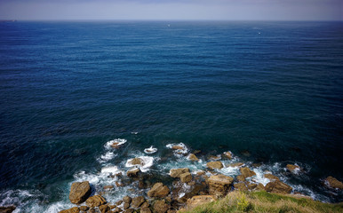 Fototapeta na wymiar Atlantic waves crushing onto rocks