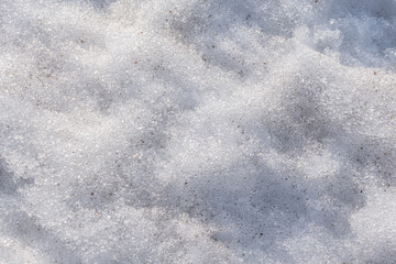 abstract background of melted spring snow close up
