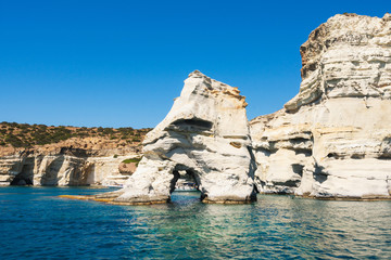 Fototapeta na wymiar Aegean Crustal Sea Water and Rock Formations in Milos Island Greece