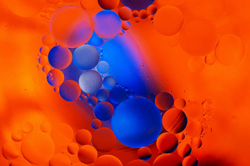 Abstract space background-Oil drops on a water surface. Close up. Selective focus.