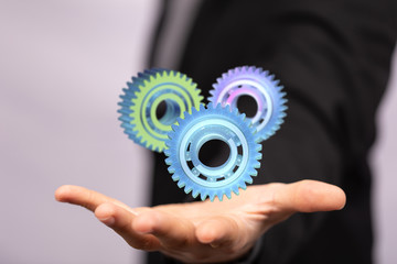 Business, Internet and technology concept. Business select gear icon on virtual screen.