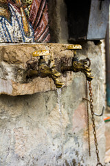 The Holy water spring and icon of the Holy Virgin on territory of Serbian Orthodox monastery (cloister) Moracha in Montenegro