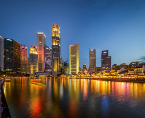 Fototapeta na wymiar Central Business District, Singapore - Aug 2019 - CBD view Merlion from Marina By blue hour sunset lights