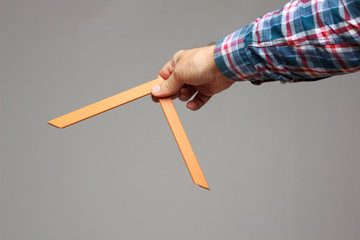 right angle in the hand of an adult