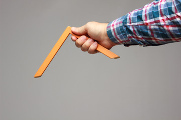 right angle in the hand of an adult