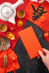 Design concept of Chinese lunar January new year - Woman holding, giving red envelopes (ang pow,...