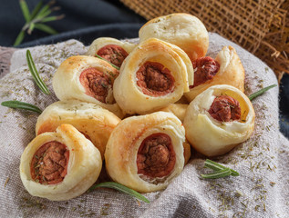 rustic sweets of puff pastry filled with frankfurters