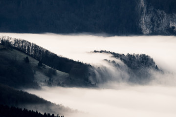 Fog wave over Mittelland at sunrise in Switzerland