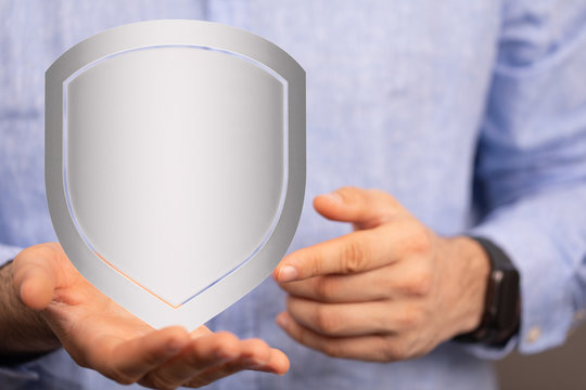 cyber shield protection concept holding in hand