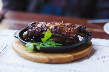 Fried ribs on a plate.