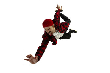 A second before falling. Caucasian young man falling down in moment with bright emotions and facial...
