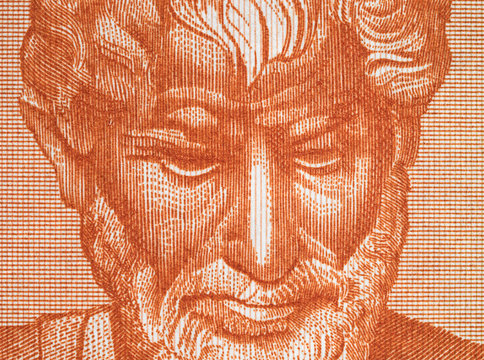 Aristotle portrait on old Greece drachma banknote close up macro. Genius Ancient Greek philosopher, Father of Western Philosophy. Vintage engraving.