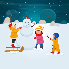 Children make a snowman together