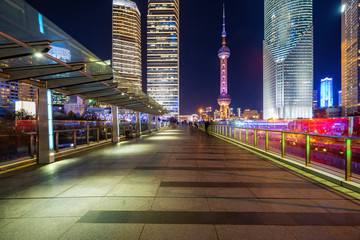 At night, footbridges and skyscrapers in Shanghai, China